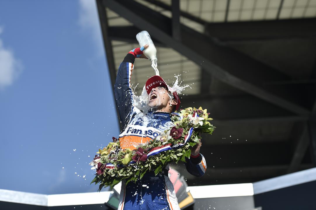 Takuma Sato cools off with milk after winning the 2020 Indianapolis 500__Ref Image Without Watermark_m29069.jpg